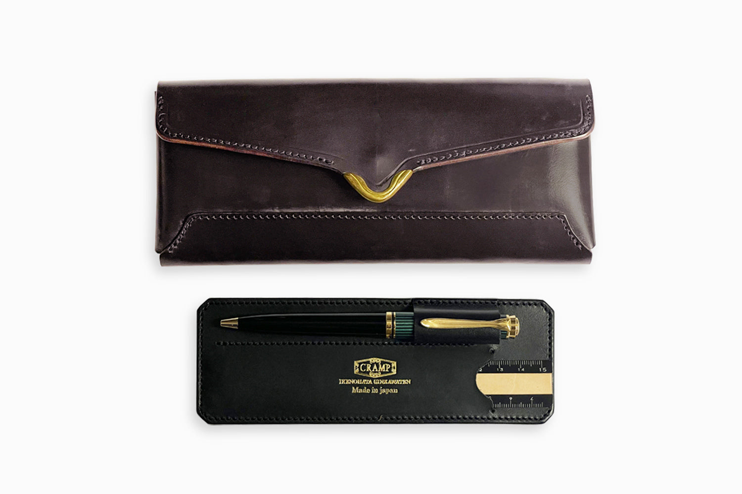 CRAMP / 池之端銀革店 真鍮のフロント金具がアクセント。 スリーブ付き