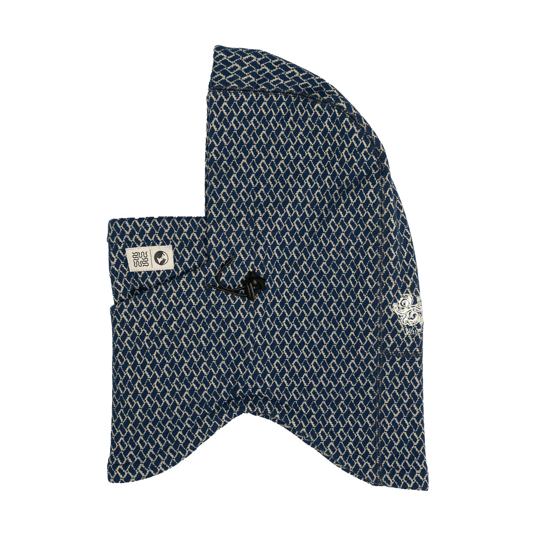 NOMADIK（ノマディック）| 777 JACQUARD HOODWARMER 2026 / BLUE/BEIGE