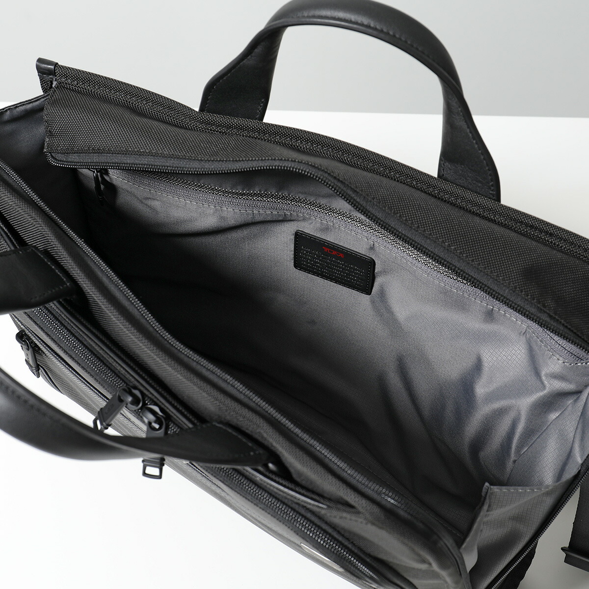 楽天市場】TUMI トゥミ ブリーフケース SLIM DELUX PORTFOLIO 117301
