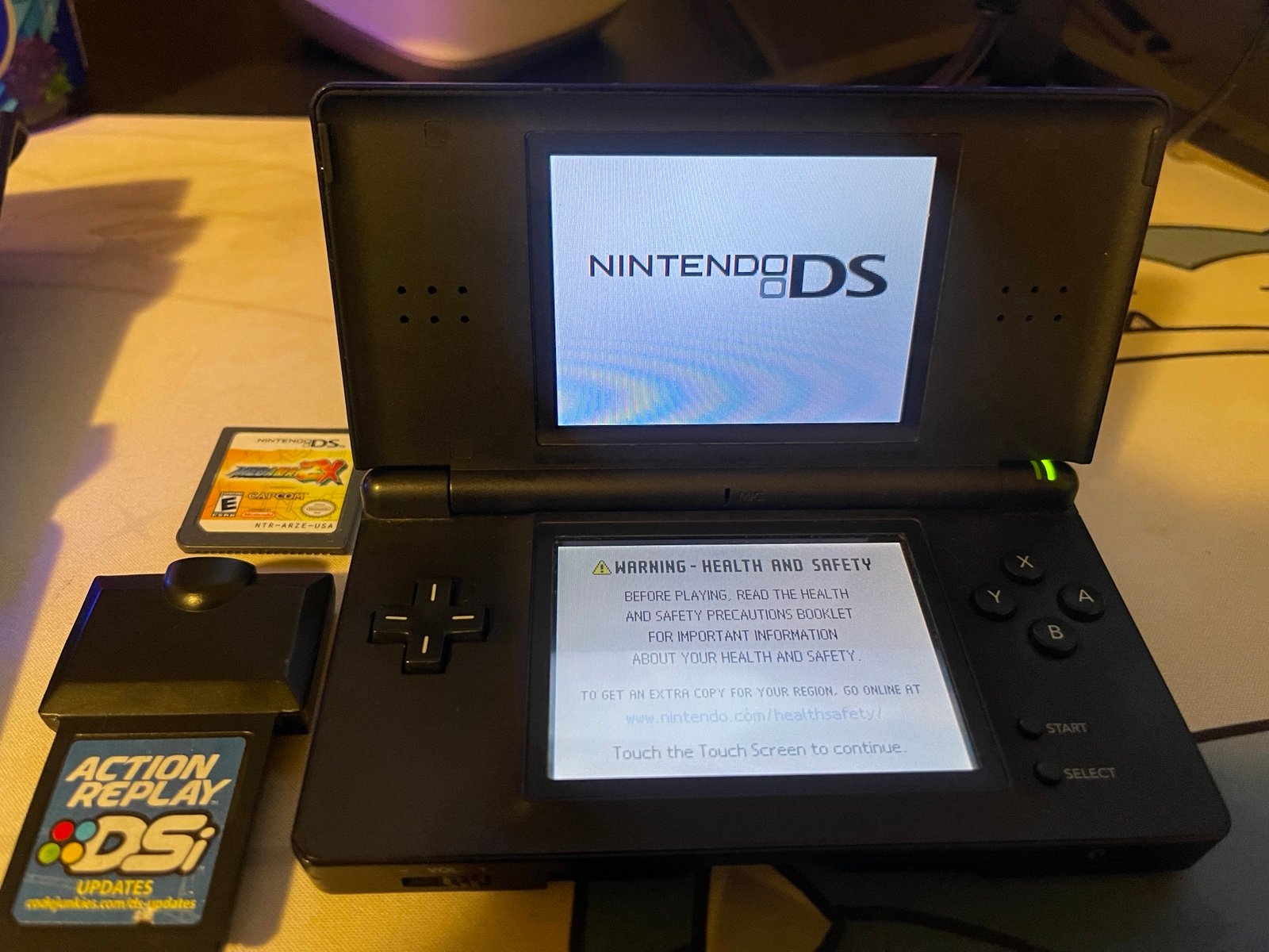 Nintendo Ds Lite + Action Replay DSi (updates) + Megaman ZX