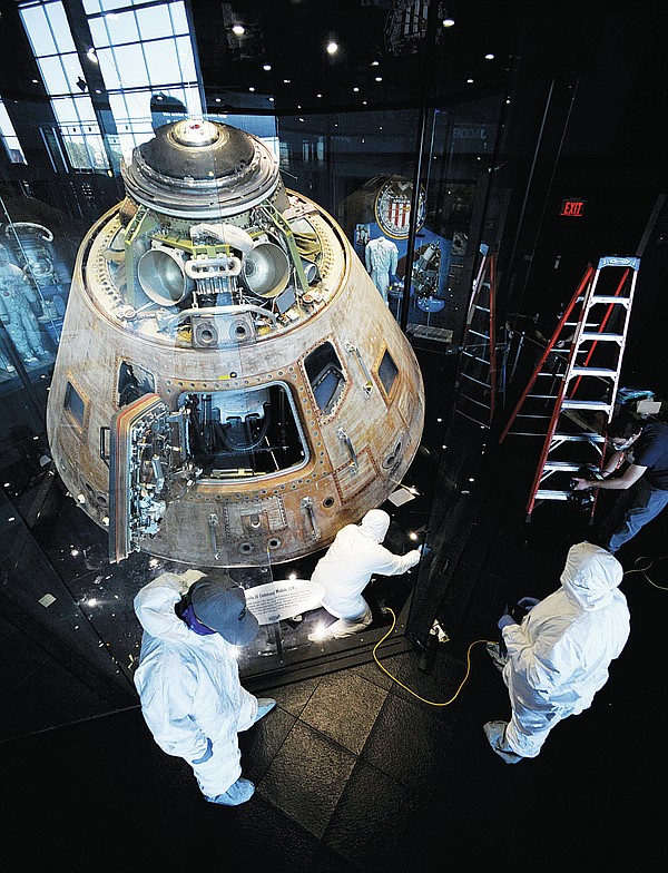 Workers clean Apollo 16 spaceship ahead of 50th anniversary