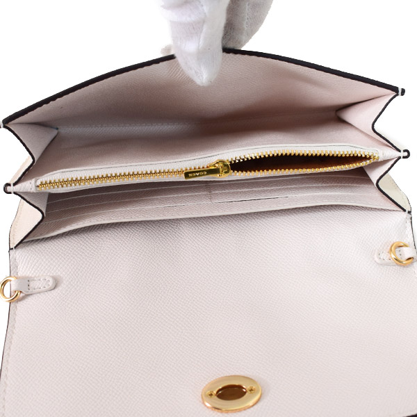 COACH】コーチ クロスグレインレザー ボウ ターンロック リボン