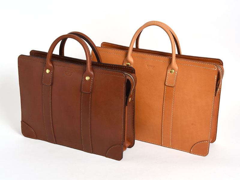 仕切り付きで二部屋構造のハードレザー二本手ビジネスバッグ / 革鞄の