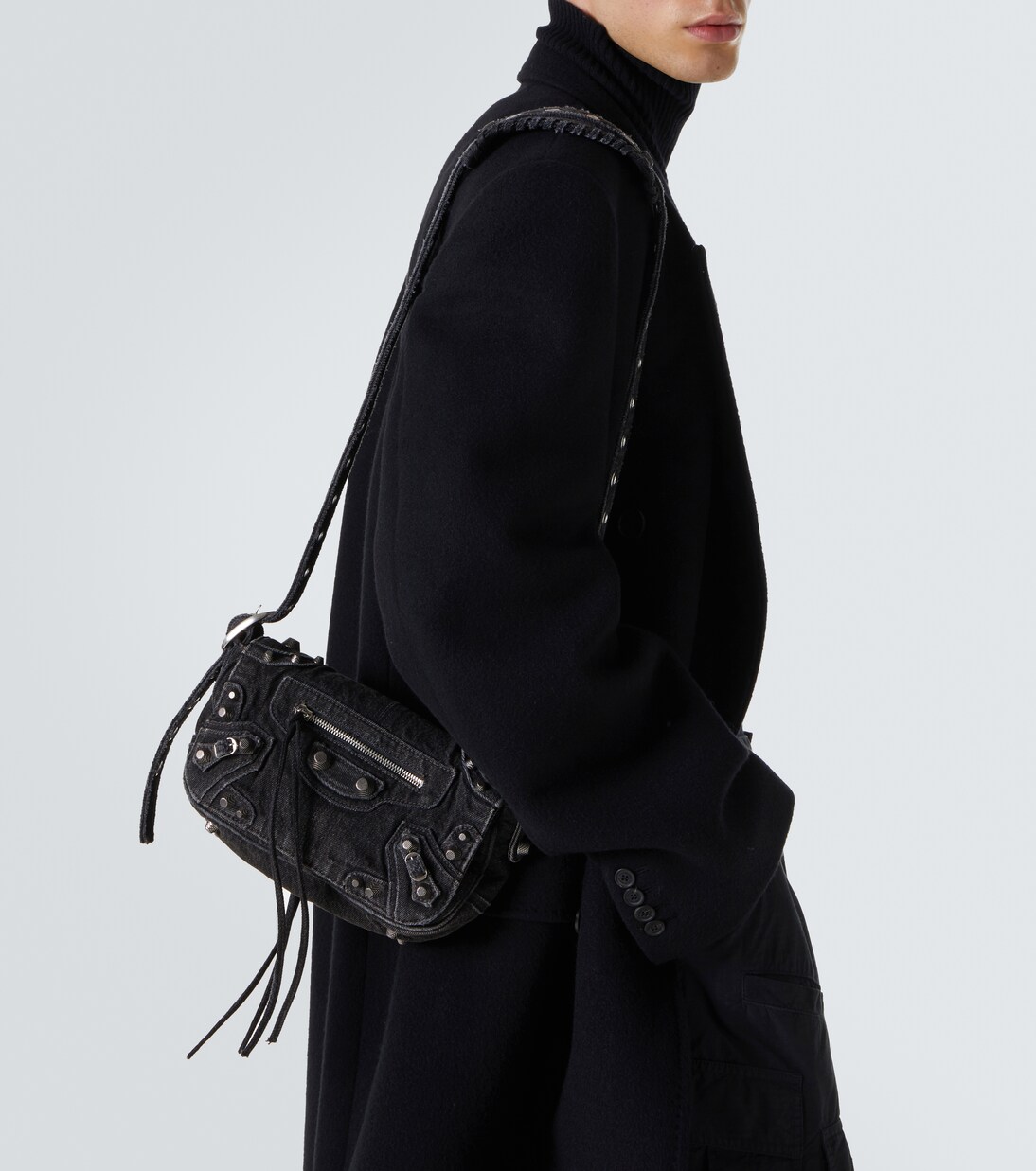 Le Cagole XS denim shoulder bag in black - Balenciaga | Mytheresa