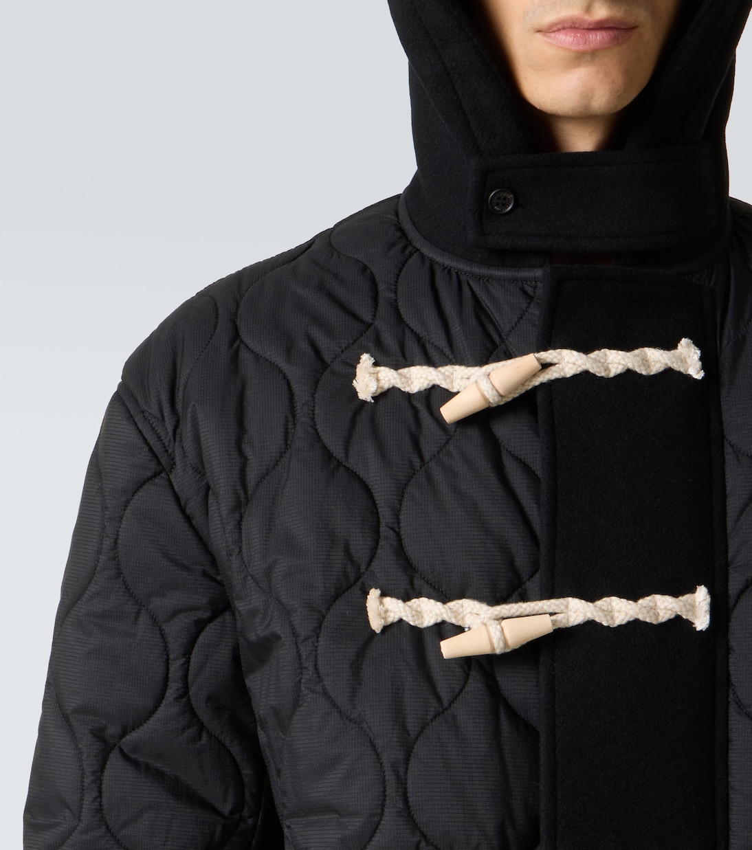 Quilted wool duffel coat in black - Comme Des Garcons Homme
