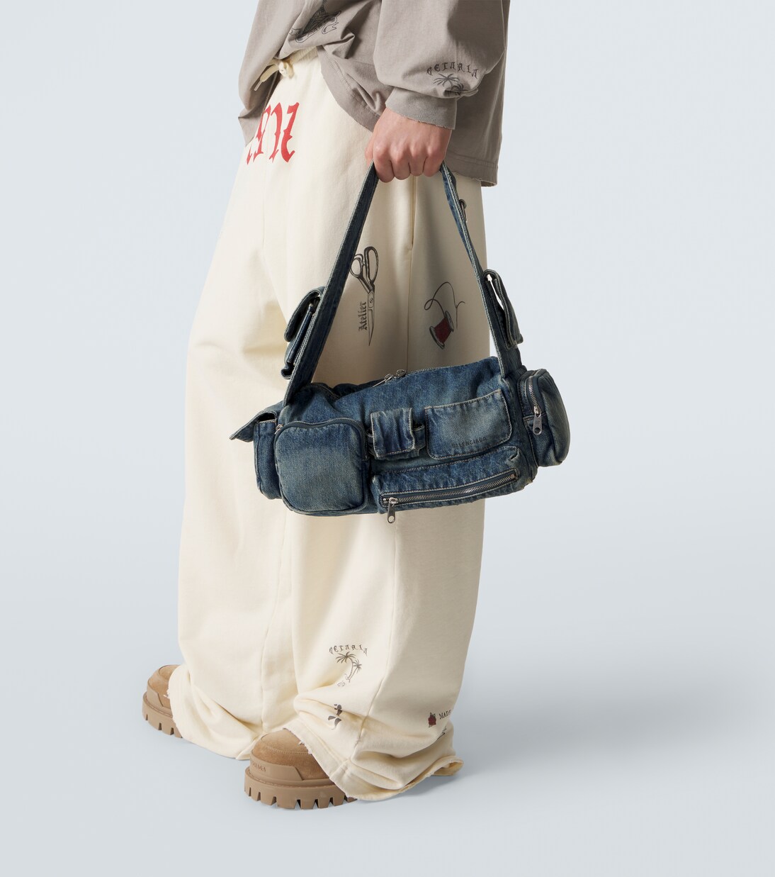 Superbusy Sling Small denim shoulder bag in blue - Balenciaga