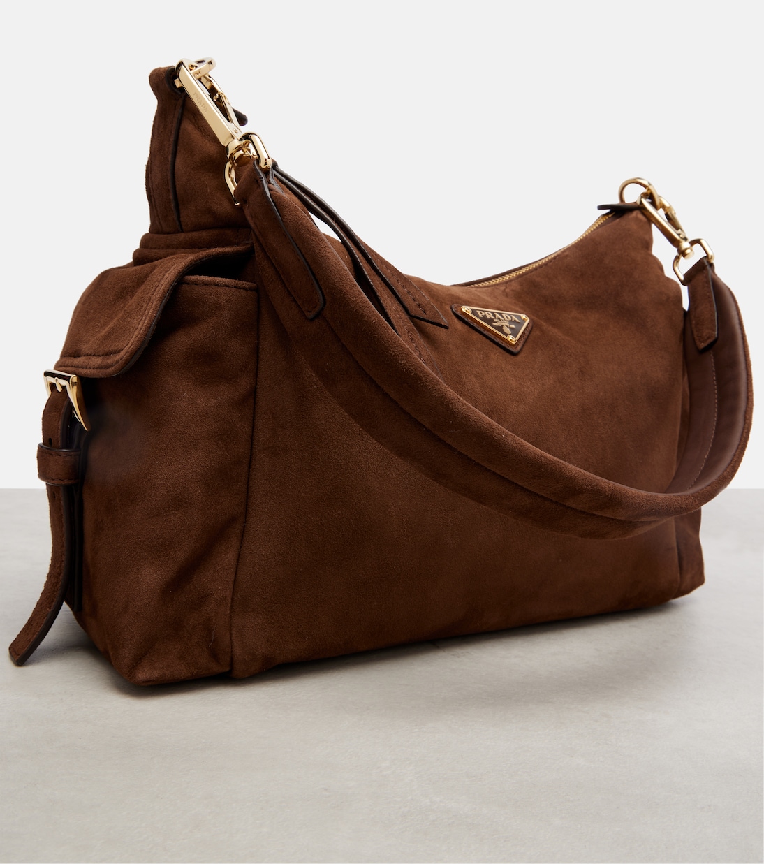 Prada Explore Large suede shoulder bag in brown - Prada | Mytheresa