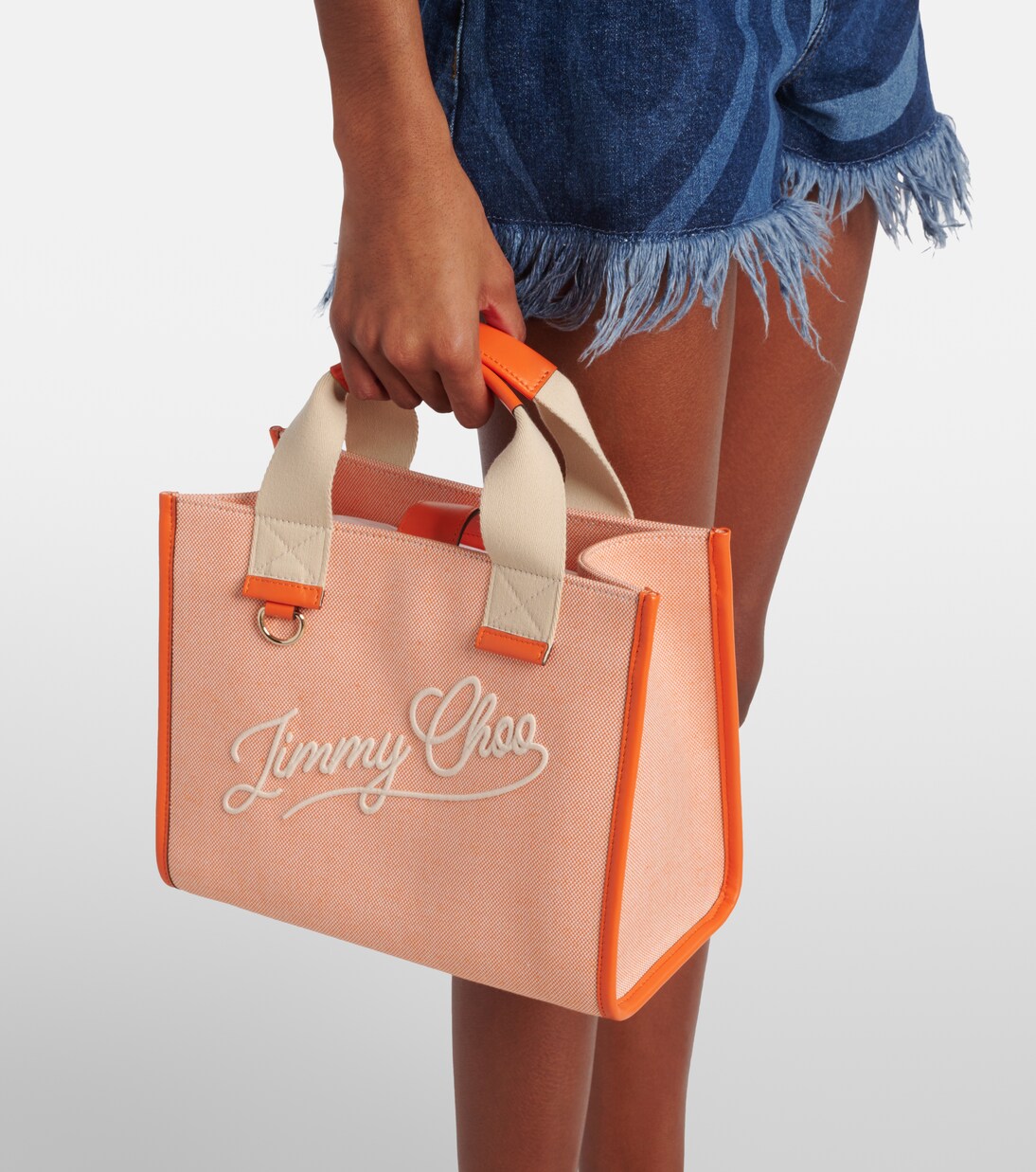 Logo leather-trimmed canvas tote bag in orange - Jimmy Choo