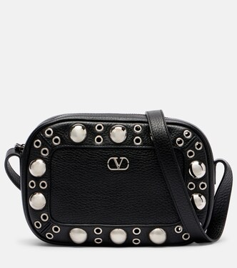 Nellcôte Small suede crossbody bag in brown - Valentino Garavani