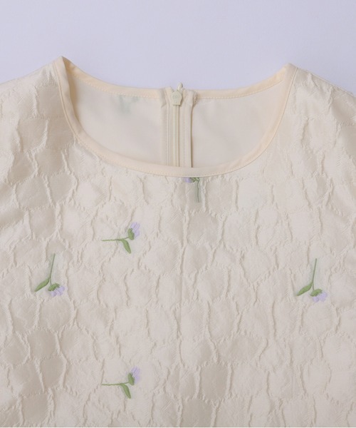 Fit more（フィットモア） フラワージャガードペプラムトップス