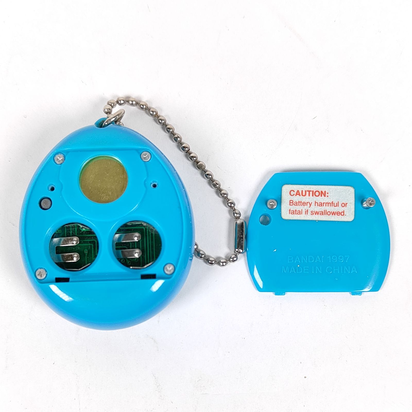 ☆ バンダイ 初代 たまごっち 水色（時計柄）香港版 ☆ - メルカリ