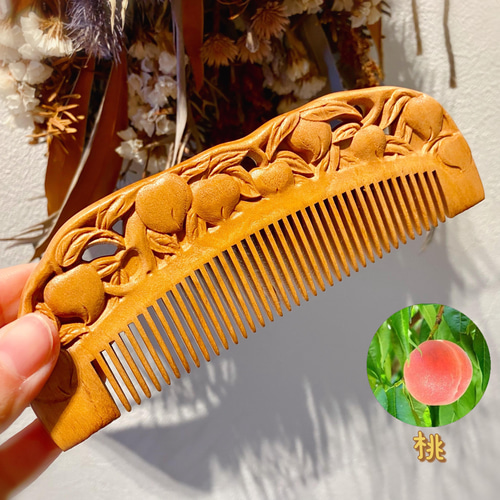 0422118 桃の木素材櫛57.6＊144.4ミリ