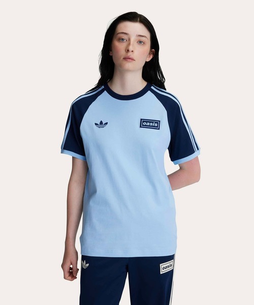 adidas Originals × Oasis ツアースリーストライプス Tシャツ