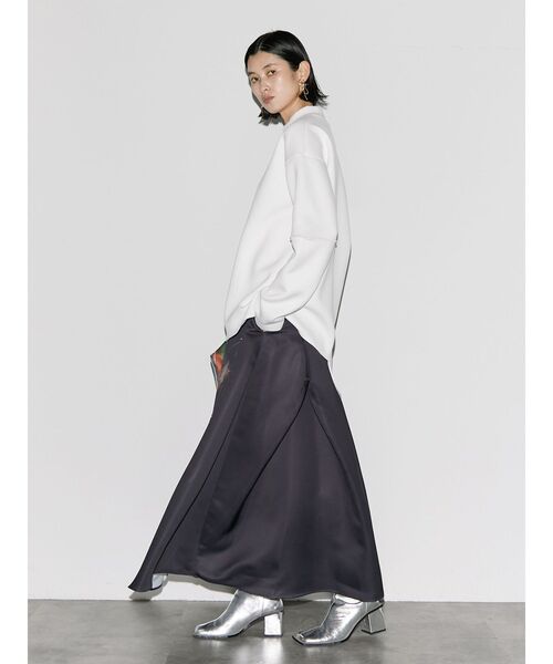 UN3D.（アンスリード）の「カーブスリットトップス（Tシャツ