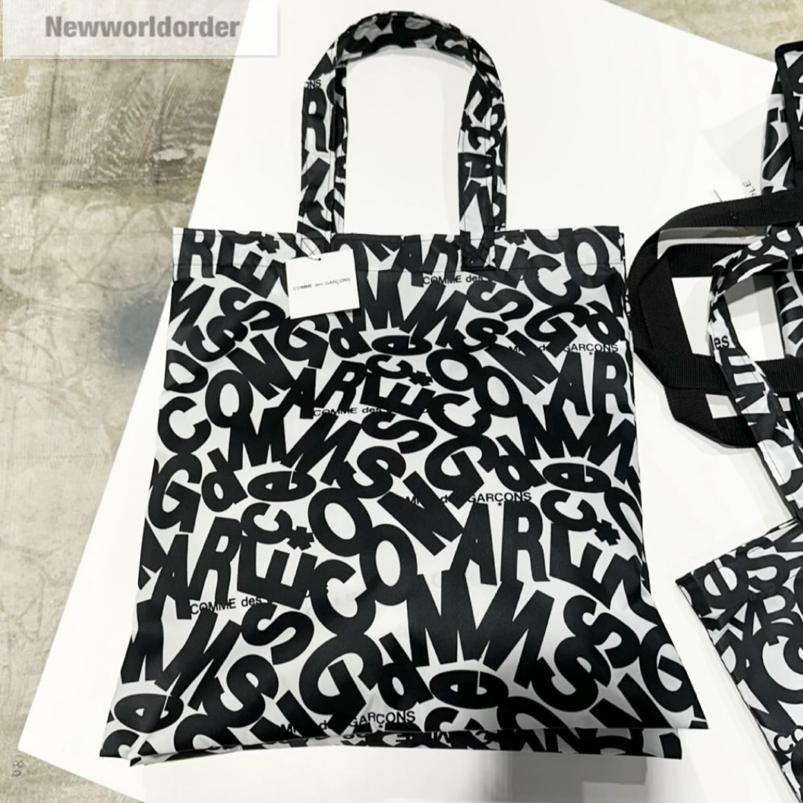 限定ホリデーコレクション】コムデギャルソンドッキングバッグ (COMME