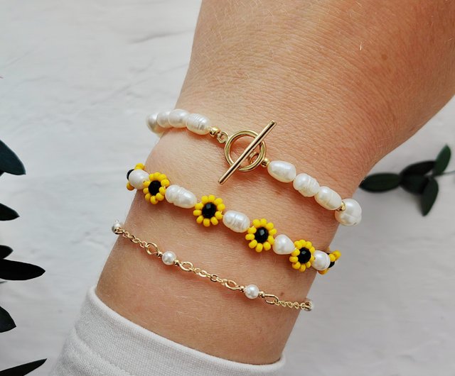 ベラルーシ ひまわりビーズブレスレット。シードビーズ、フラワー