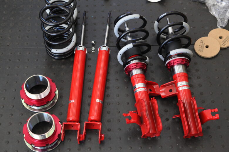 L33 ティアナ タナベの車高調取り付け 四輪アライメント - カー用品持