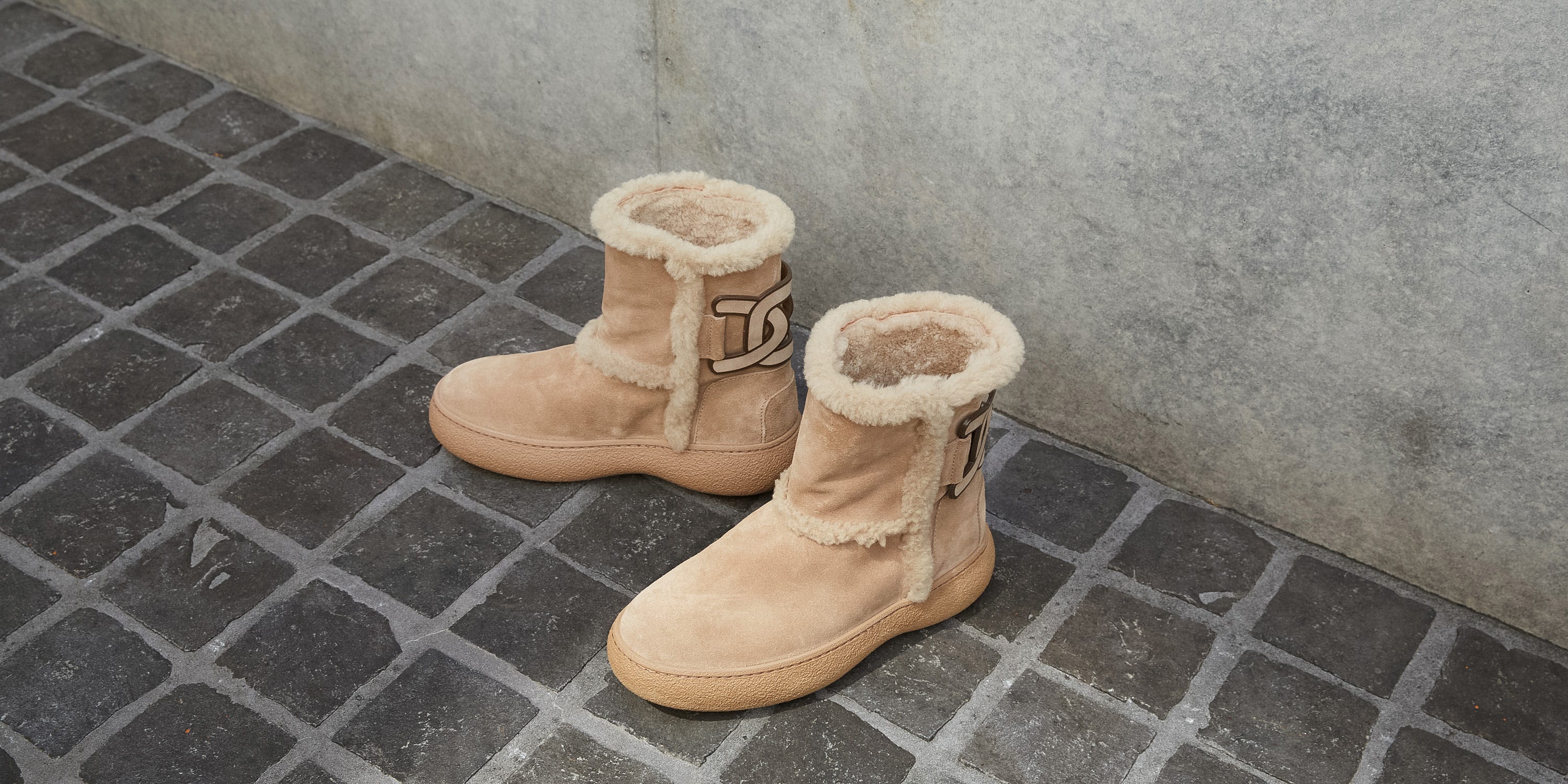トッズの歴史を刻む「ゴンミーニ」のブーツからシアリングファーが新登場