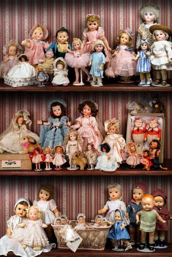 Gorgeous shelved doll collection back when dolls were still magical.
