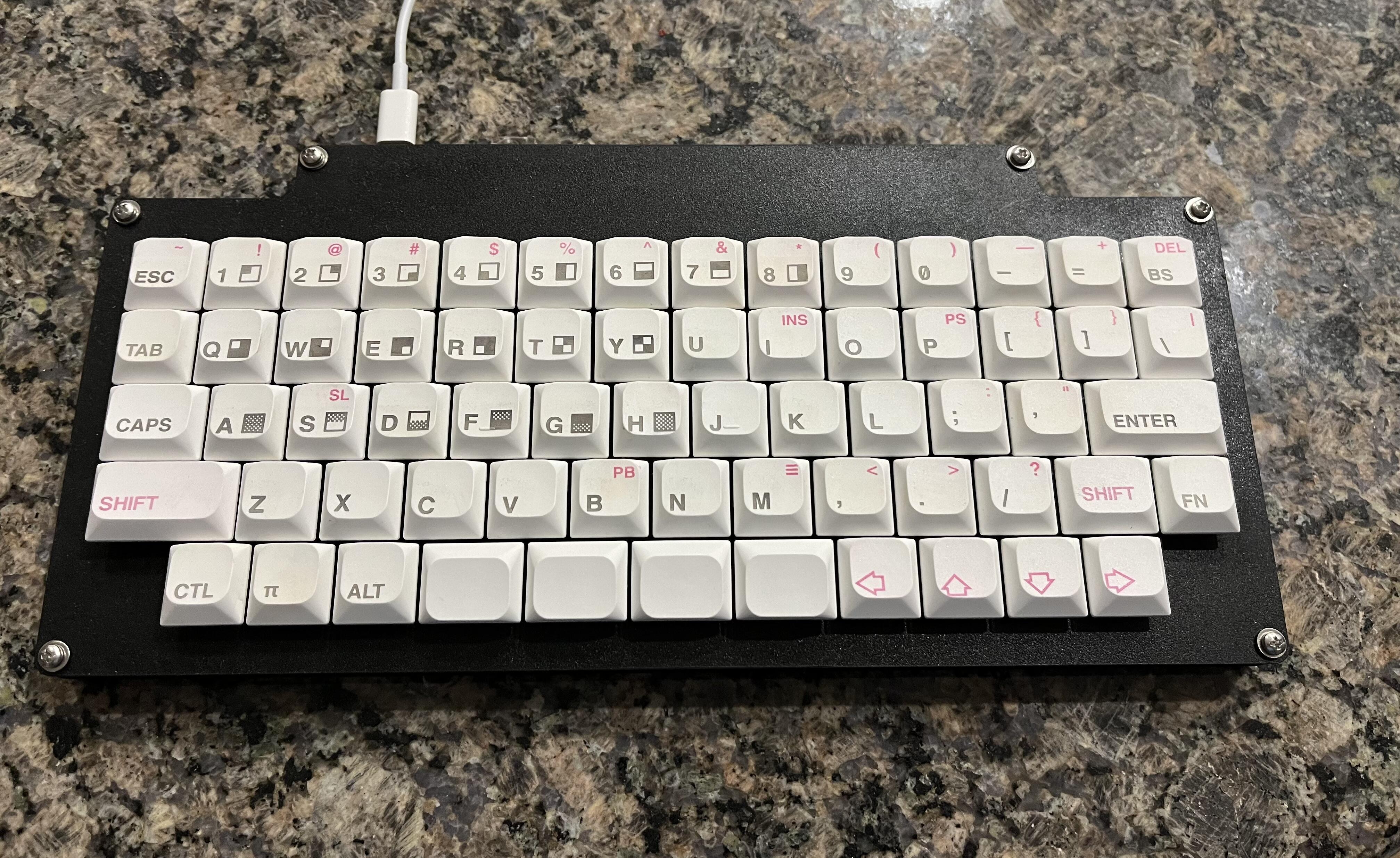 Quick and dirty laser-cut DIY board. Did the keycap legends on my