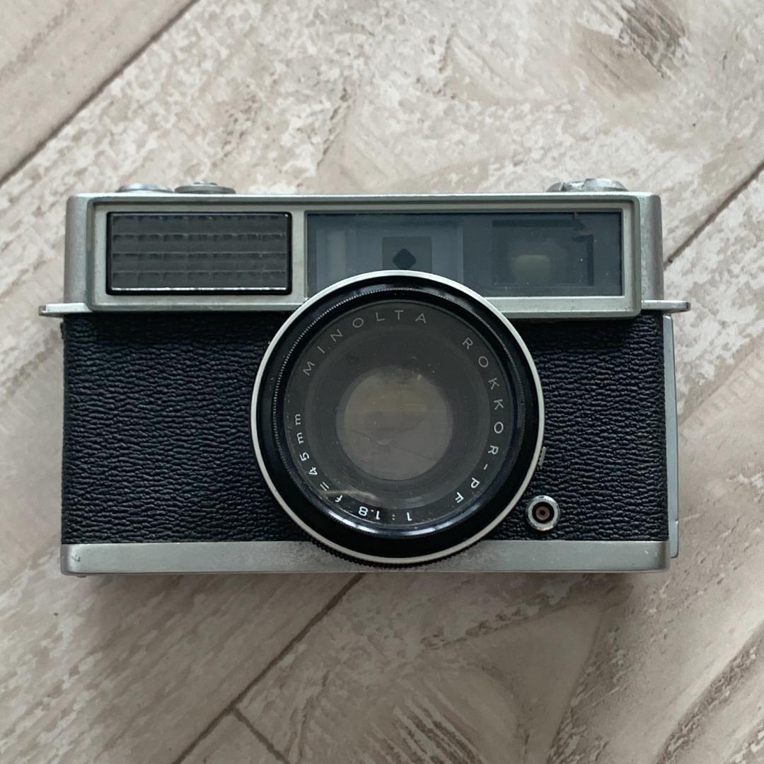 1960-1970 Minolta AL-2 f1.8 45mm film camera with working light