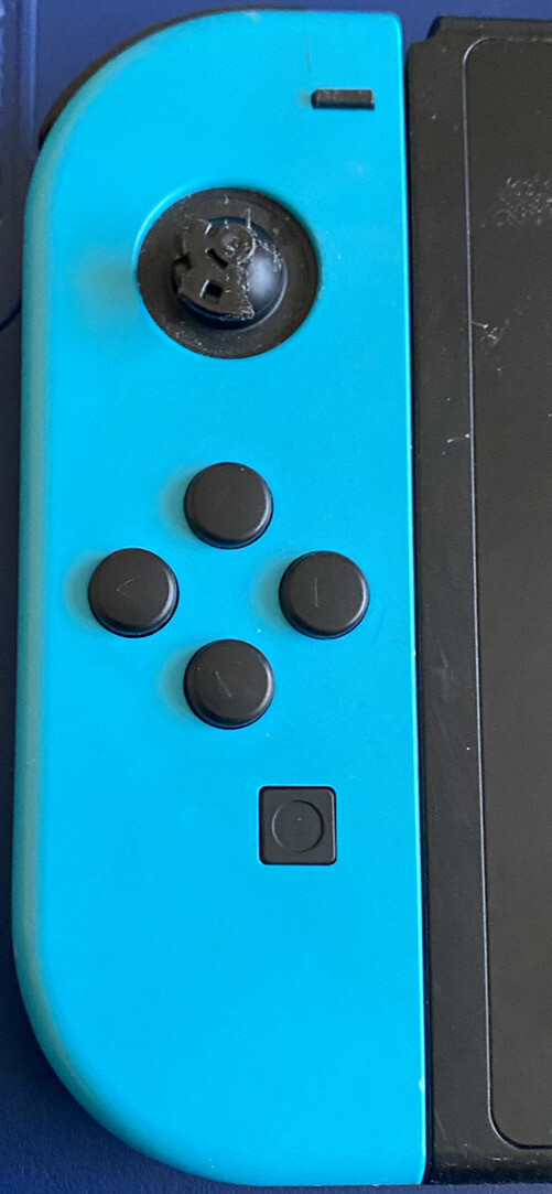 Nintendo Switch Console ONLY (NO DOCK) w/ Grip, Red & Blue Joycons