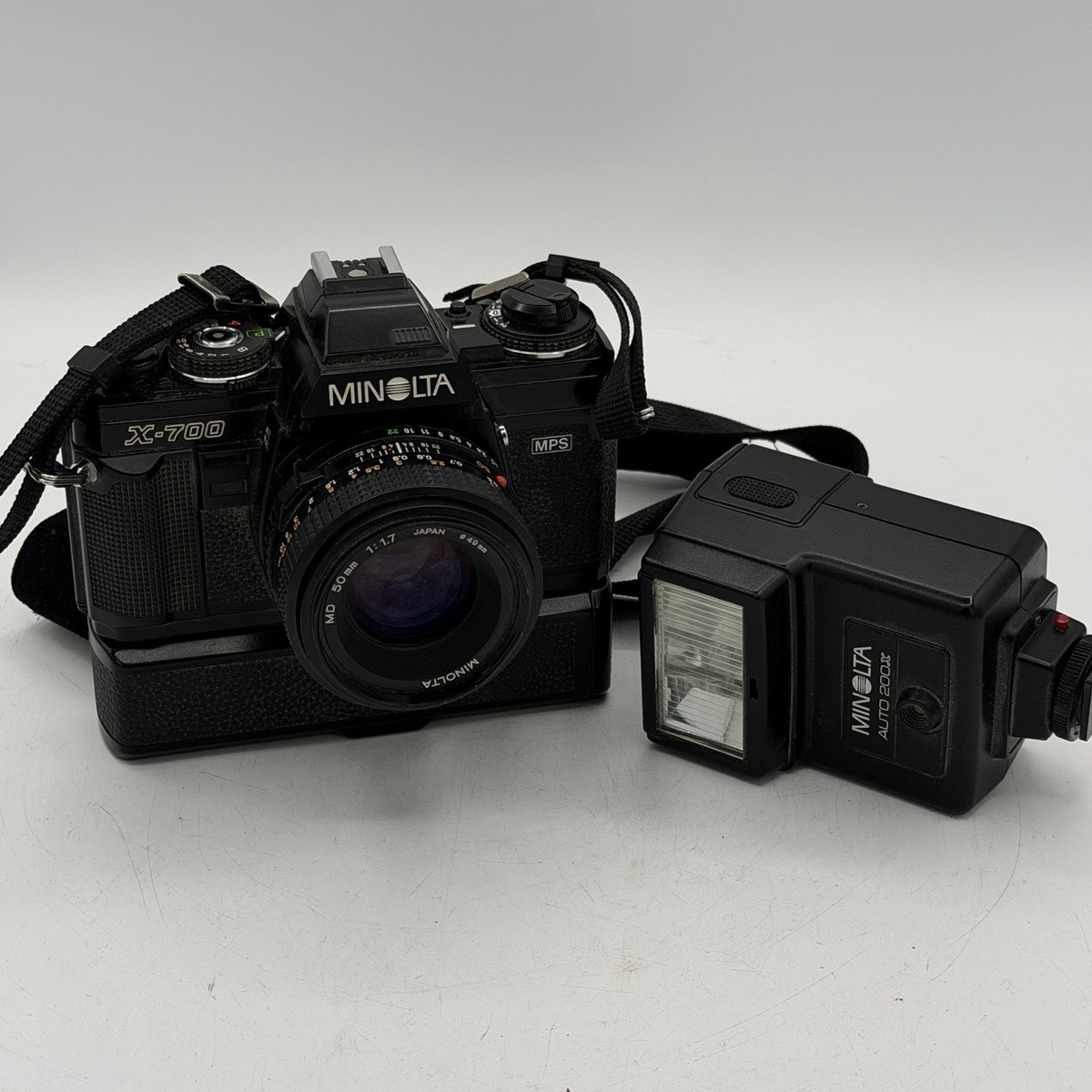 Minolta X-700 Film Camera 50mm F/1.7 Lens, Flash, and Battery Grip
