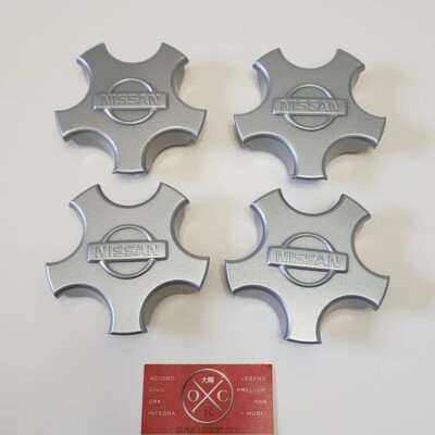 Genuine OEM Nissan 95-98 240SX SE Wheel Center Cap Set Of 4 NEW