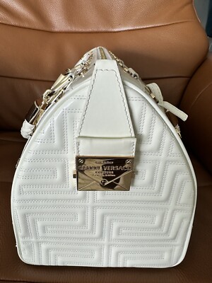 Authentic Gianni Versace white quilted patent leather “snap out of