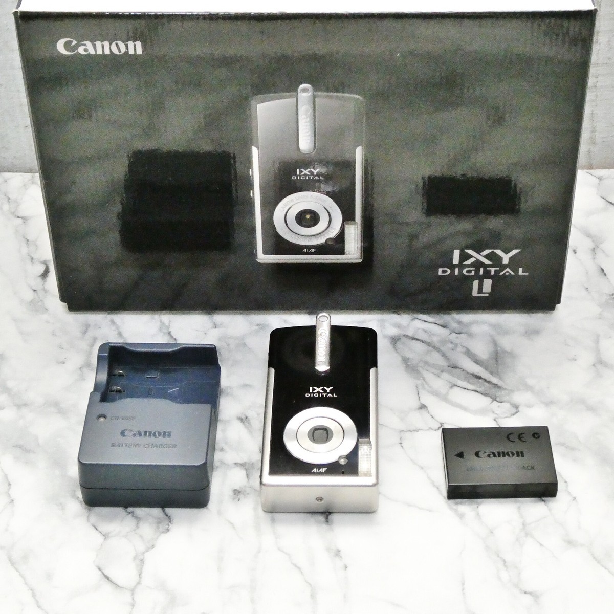 Canon IXY DIGITAL L Piano Black 4.0MP Camera fixed focal length
