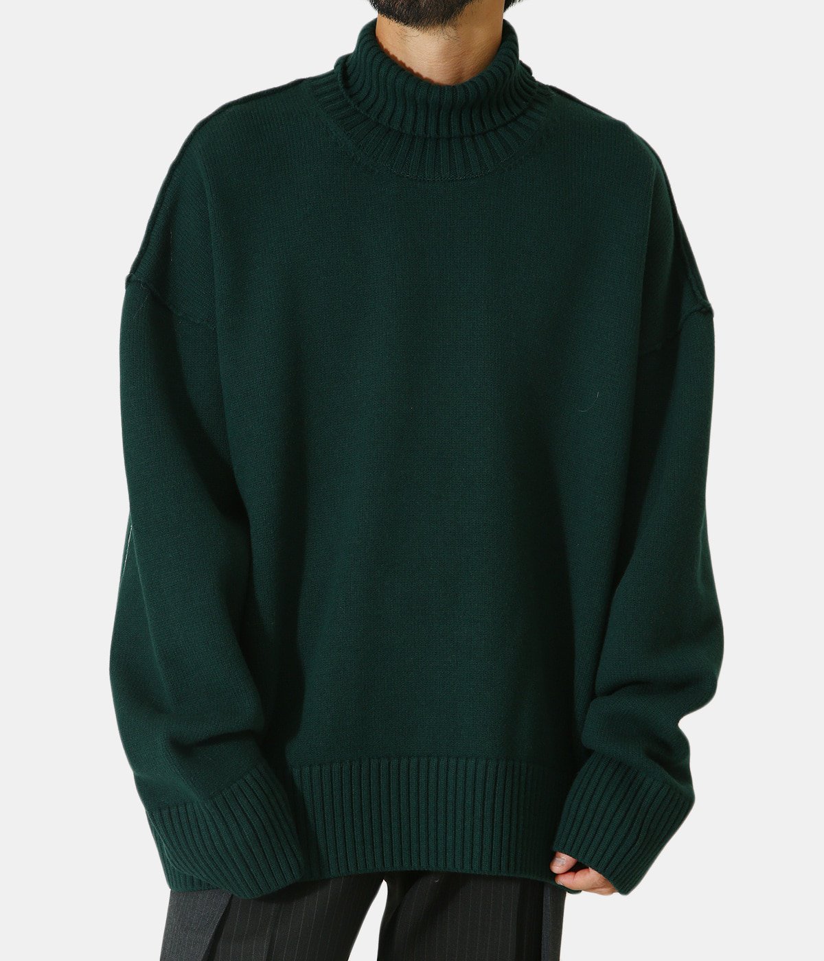OVERSIZED IMPRESSION HIGH NECK KNIT LS