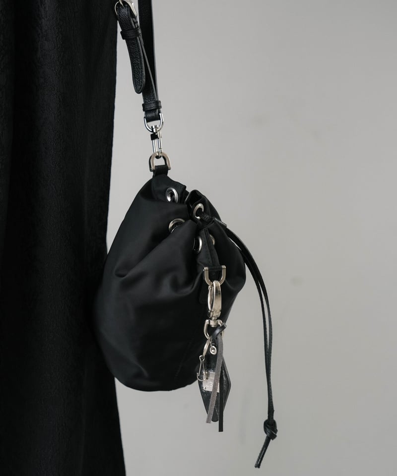 01 LUXURY MATERIAL DRAWSTRING BAG by LIMONTA |