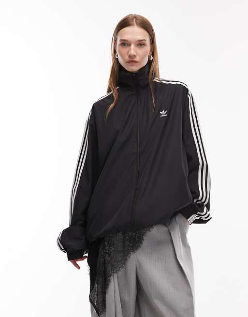 adidas Originals Firebird oversized woven track top in black | ASOS