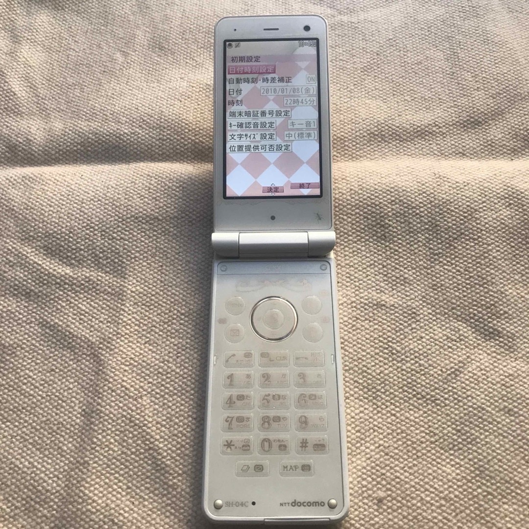 ドコモ 携帯電話 ガラケー SH-04C ビスケット Q-pot. docomoの通販 by