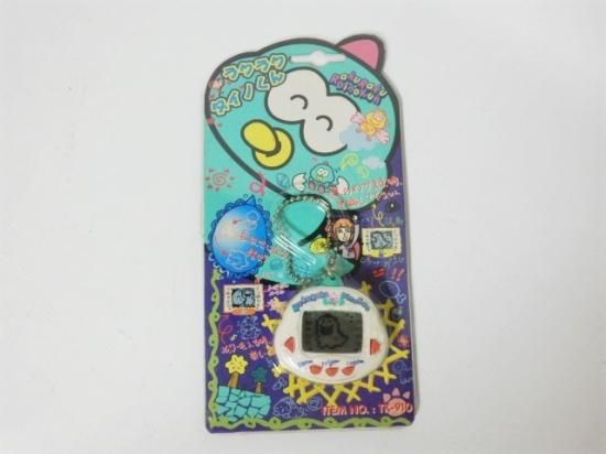 携帯型恐竜育成ゲーム ラクラク ダイノくん（白） - 「宝の森」昭和