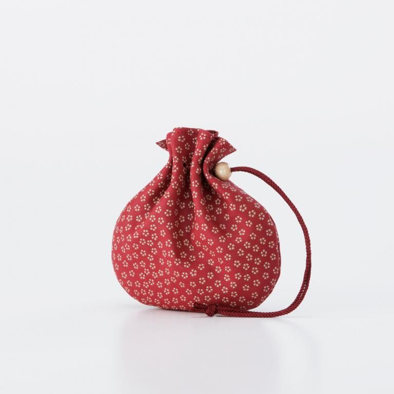 巾着［赤地×白漆×小桜］：印傳屋公式オンラインショップ｜INDEN-YA