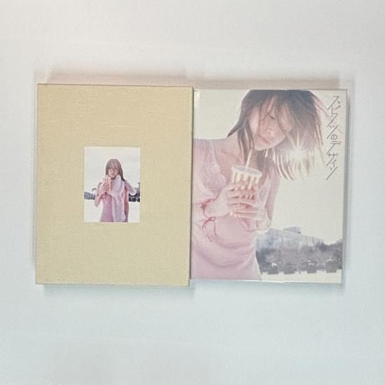 スピッツ 限定版写真集 スピッツのデザイン 豪華な布張りケース 予約