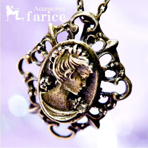 アンティークゴールドカラー メタルカメオ 花飾り女性の横顔レリーフ