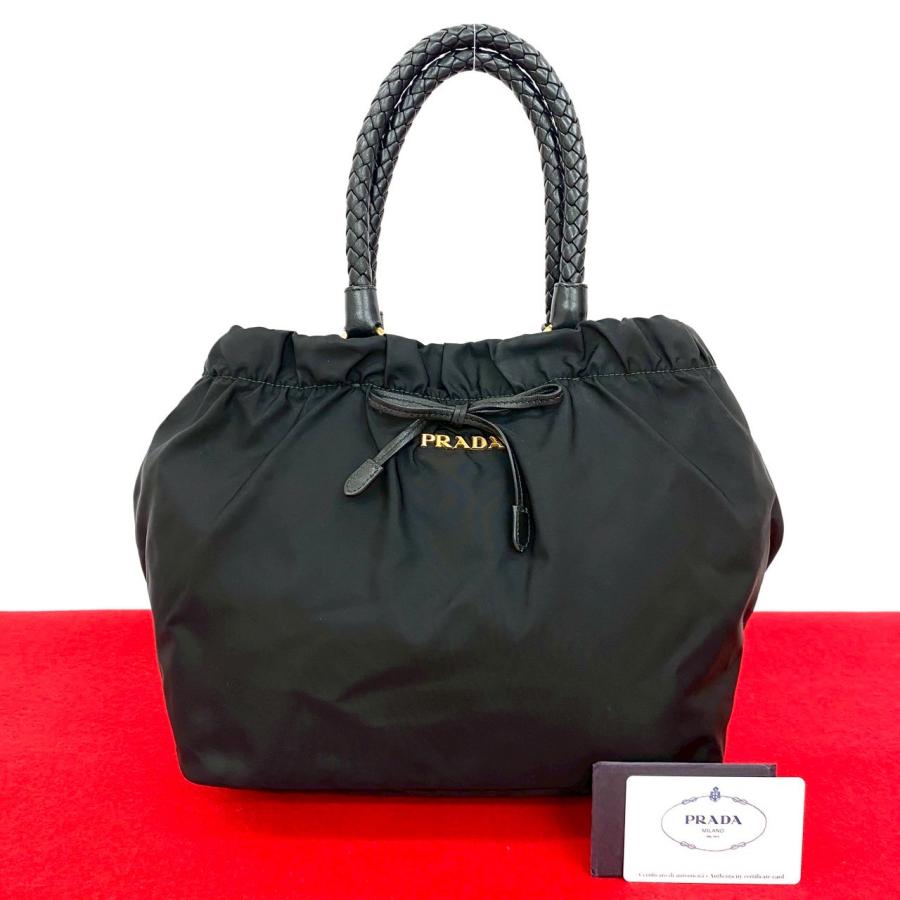 PRADA（プラダ） 極 美品 ロゴ 金具 リボン モチーフ ナイロン レザー