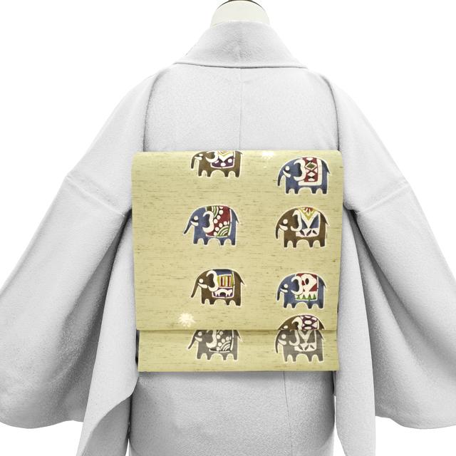 名古屋帯 九寸 正絹 未使用 東京染 紅型染 木蘭色 ぜんまい紬 象 ヤシ