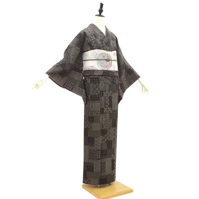 本場大島紬 着物 未使用 正絹 袷 大島紬 7マルキ こげ茶 寄せ柄 新古