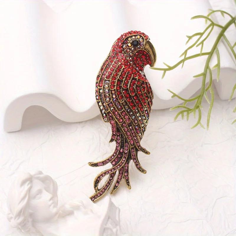 ブローチ 鳥 インコ オウム ワシ 鷲 黒 赤 ラインストーン レディース