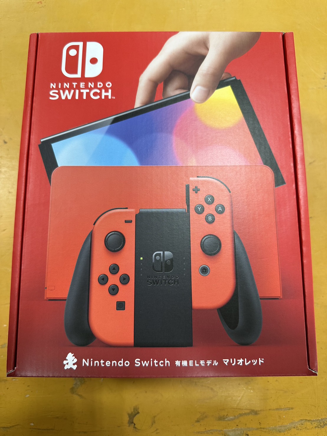 □未使用品のニンテンドースイッチ有機EL「マリオレッド」を買い取らせ