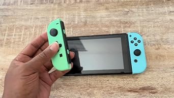 Amazon.com: Nintendo Switch with Neon Blue and Neon Red Joy-Con +