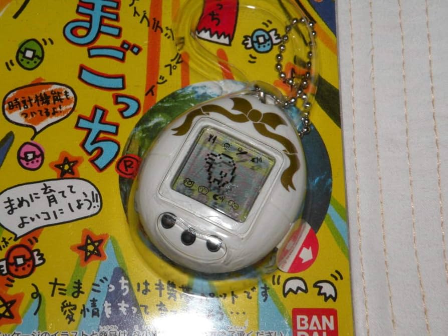 Amazon.co.jp: 株主限定 株主優待 初代たまごっち 金リボン : おもちゃ