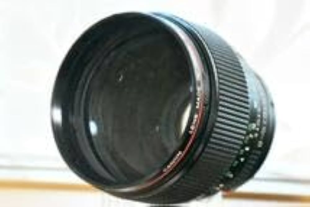 Amazon | オールドレンズ 神 レンズ New FD 85mm F1.2L | カメラ用交換