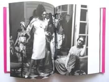 Amazon.co.jp: 洋書イヴ・サンローラン 40周年記念 写真集 本 作品