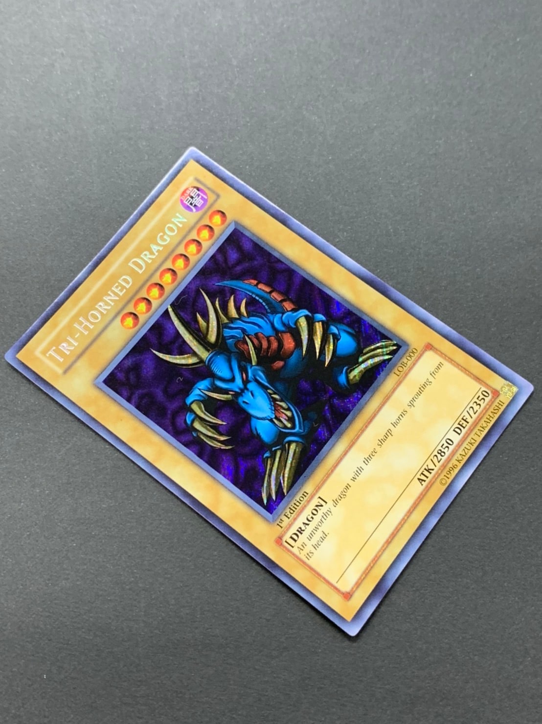 TRI-HORNED DRAGON /トライホーン・ドラゴン[旧ｱｼﾞｱｼｰｸﾚｯﾄ]《1st》(LOB