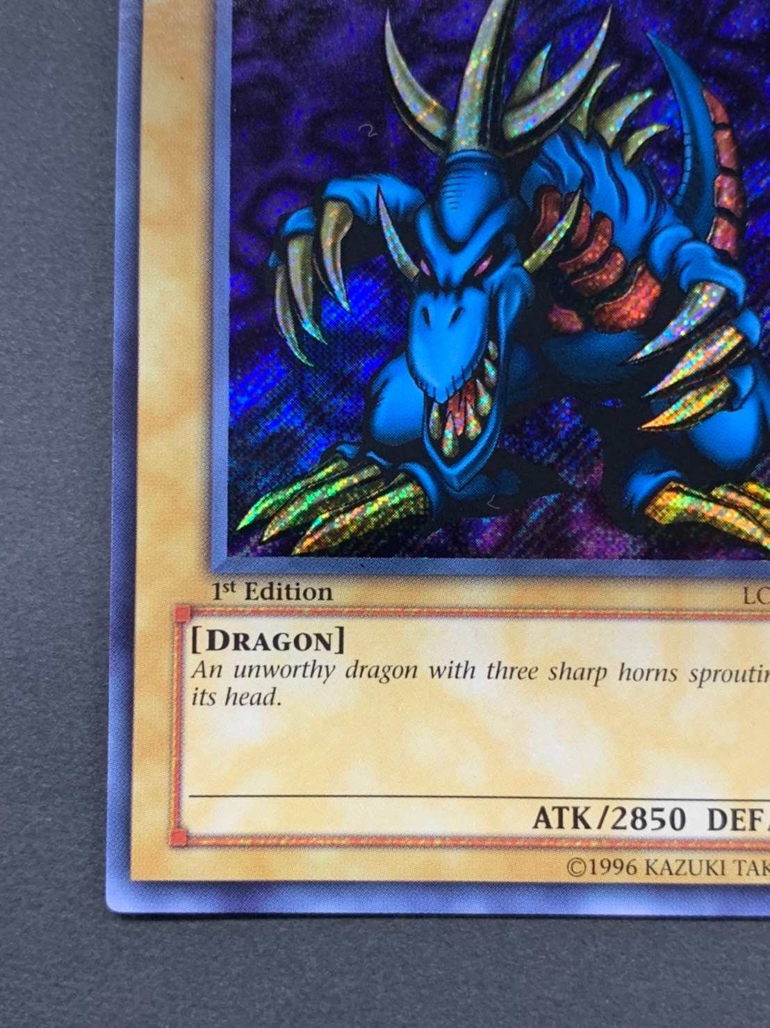 TRI-HORNED DRAGON /トライホーン・ドラゴン[旧ｱｼﾞｱｼｰｸﾚｯﾄ]《1st》(LOB