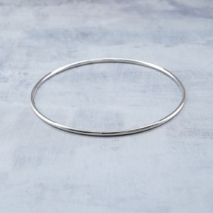 0020380SVL SV925製バングル 約7×7cm,幅3.5mm厚み2.0mm,内周約20cm 1ヶ